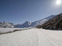 Winter Road Through Mountains