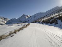 Winter Road Through Mountains