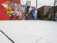 Winter Urban Scene in Detroit: Graffiti Wall and Snow-Covered Road