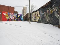Winter Urban Scene in Detroit: Graffiti Wall and Snow-Covered Road