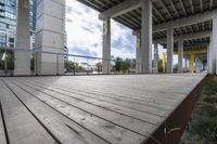 a wooden boardwalk on an empty building site for skateboarders to ride down the ramp