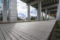 a wooden boardwalk on an empty building site for skateboarders to ride down the ramp