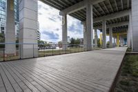 a wooden boardwalk on an empty building site for skateboarders to ride down the ramp