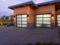 two modern wooden garages in a home setting at twilight in northern california, usa