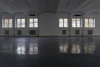 Wooden Flooring in a Property Hall with Glass Windows