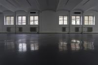 Wooden Flooring in a Property Hall with Glass Windows