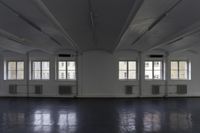 Wooden Flooring in a Property Hall with Glass Windows