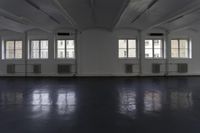 Wooden Flooring in a Property Hall with Glass Windows