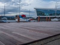 Wooden Pier on a Calm Lake Under a Cloudy Day