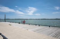 Wooden Pier on a Lake with Open Space