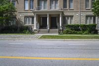 Yellow House in Toronto's Residential Area