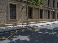 the side walk and walkway of a building is marked with markings for parking spaces below