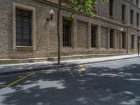 the side walk and walkway of a building is marked with markings for parking spaces below