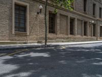 the side walk and walkway of a building is marked with markings for parking spaces below