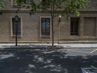 the side walk and walkway of a building is marked with markings for parking spaces below