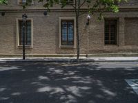 the side walk and walkway of a building is marked with markings for parking spaces below