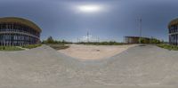 an 360 - view is looking down on a parking lot with several parking spots in the center and in the middle