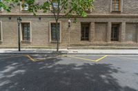 the side walk and walkway of a building is marked with markings for parking spaces below