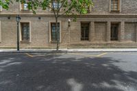 the side walk and walkway of a building is marked with markings for parking spaces below