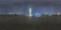 a beautiful looking building and water in a big city by night time exposurer digital art