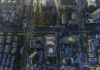 this is a bird's eye view of the cityscape from above, with tall buildings