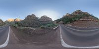 four wide angles of a road with mountain in backrout at dusk in the daytime