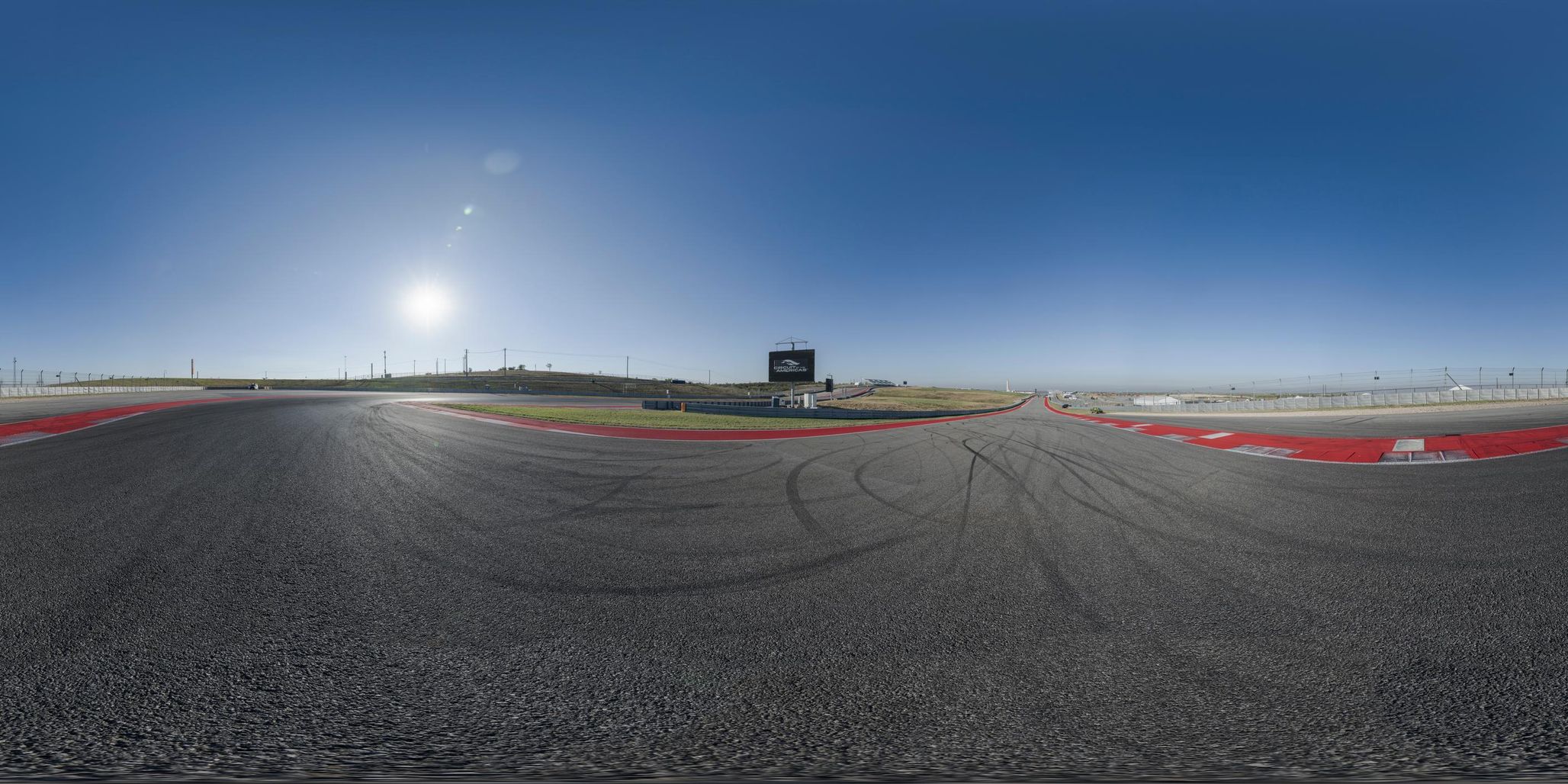 Aerial View of a Race Track with the Sun Behind HDRi Maps and Backplates