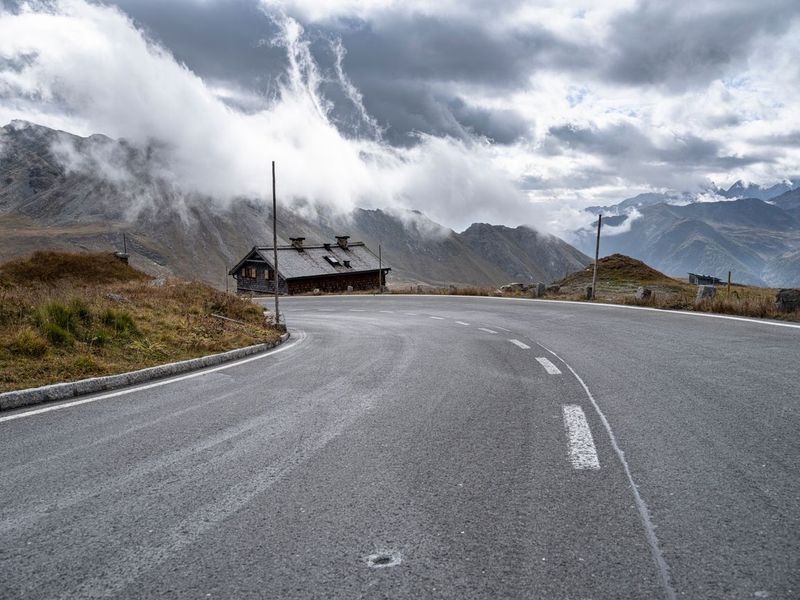 Asphalt Road Curving Through Austrian Mountains HDRi Maps and Backplates