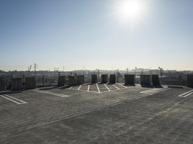 Cityscape View with Parking Lot and Sunny Sky HDRi Maps and Backplates