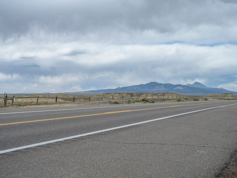 Colorado Landscape with Clouds and Sign HDRi Maps and Backplates