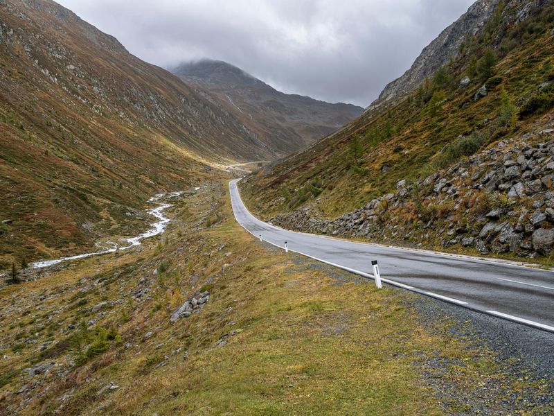 Dramatic Austrian Mountains under a Gloomy Sky HDRi Maps and Backplates