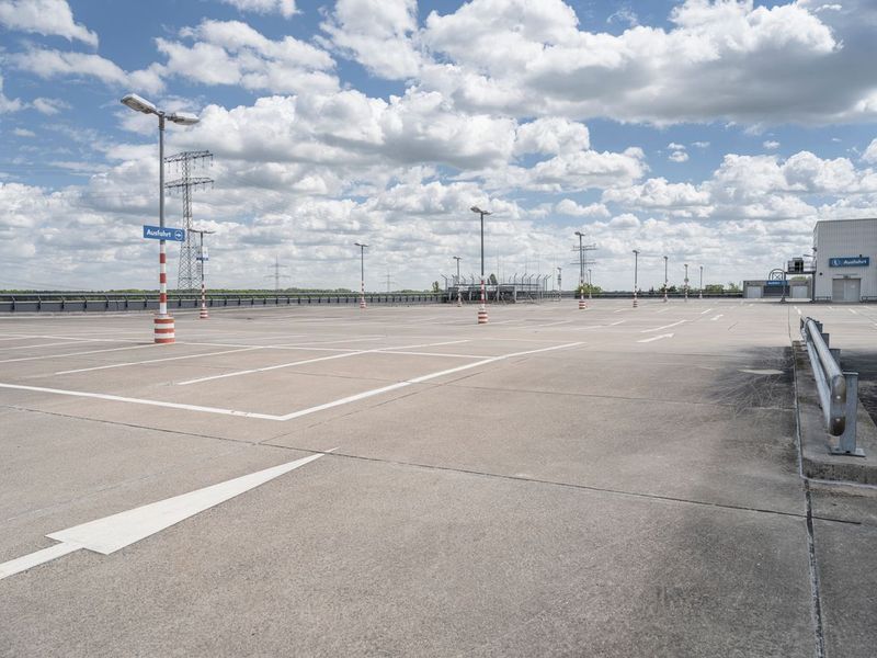 Empty Parking Lot under Cloudy Skies in Berlin HDRi Maps and Backplates