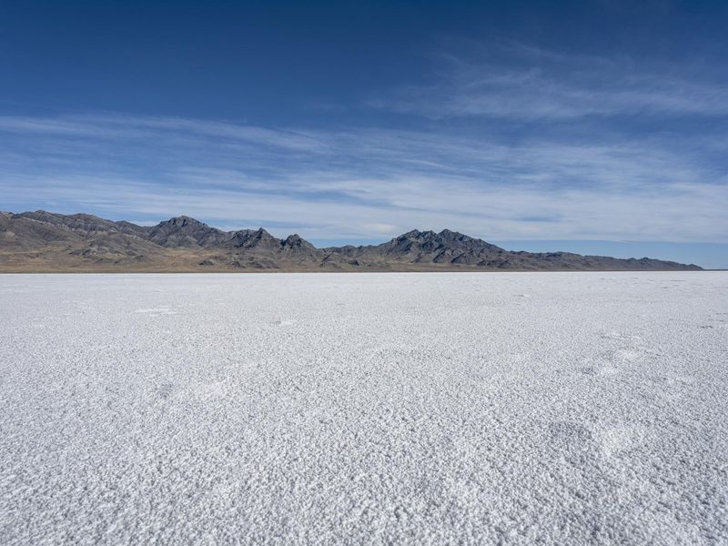 Empty Plain with Mountains in Utah, USA