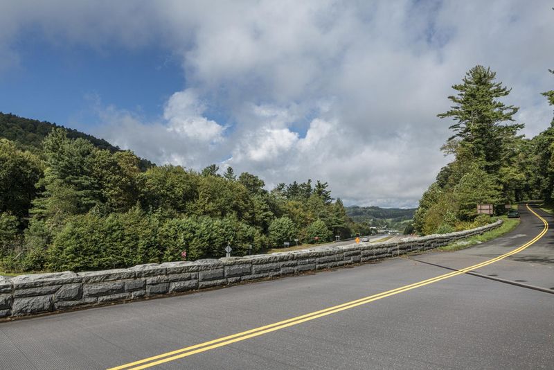 Empty Road Through Forest and Mountains under a Blue Sky HDRi Maps and ...