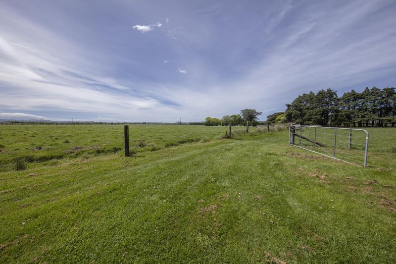 Green Landscape in Rural Field Under Clouds HDRi Maps and Backplates