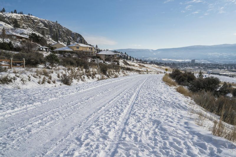 Kelowna Valley in Canada A SnowCovered Road