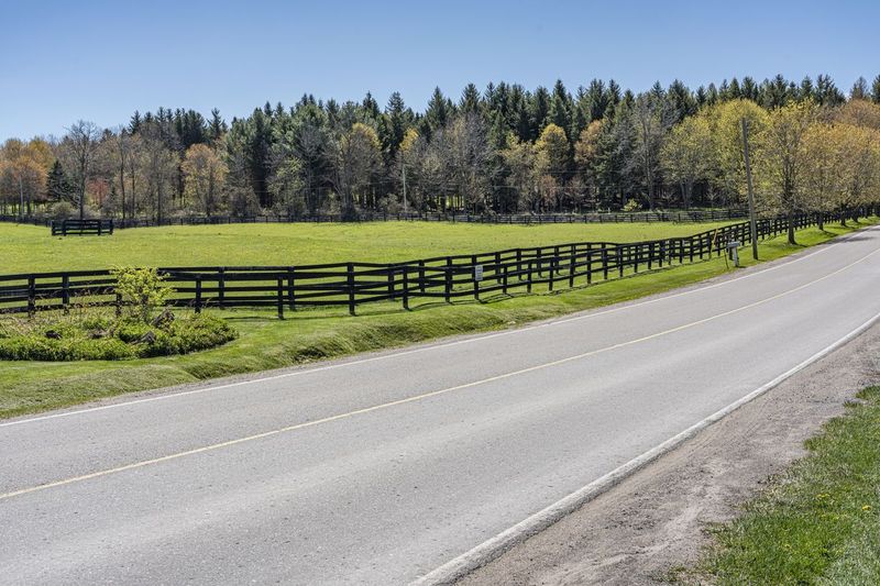 Lush Green Landscape at Farm Entry HDRi Maps and Backplates