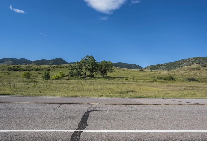 Lush Landscape under Clear Sky on a Day HDRi Maps and Backplates