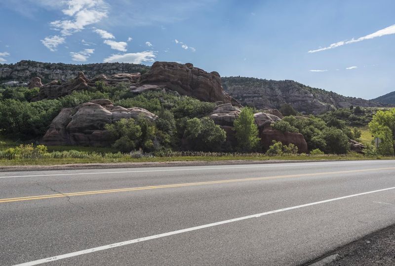A Road Through a Lush Landscape and Clear Sky HDRi Maps and Backplates