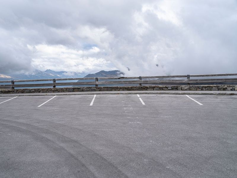 Mountain Parking Lot Under Cloudy Sky HDRi Maps and Backplates