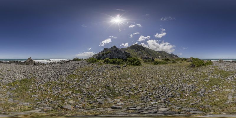 Mountain Range and Grassy Field under a Clear Sky HDRi Maps and Backplates