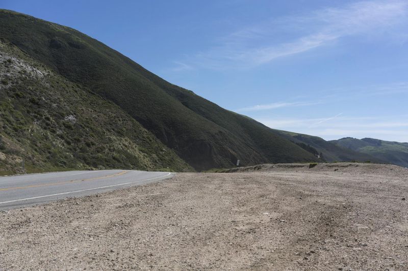 Mountain Road through Highlands under Clear Skies HDRi Maps and Backplates