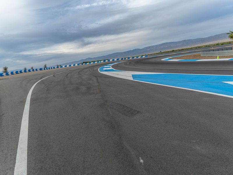 Race Track: Asphalt Curves on a Sunny Day HDRi Maps and Backplates