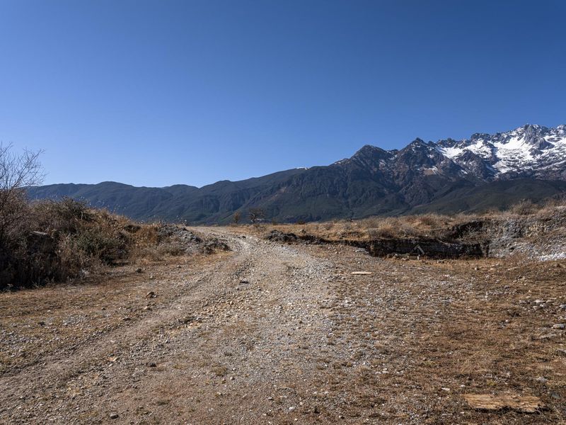 Scenic Dirt Road Leading through Snow-Capped Mountains HDRi Maps and ...