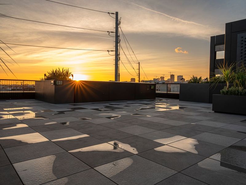 Urban Dawn: Sun Setting on City Rooftop with Square Tiles HDRi Maps and ...