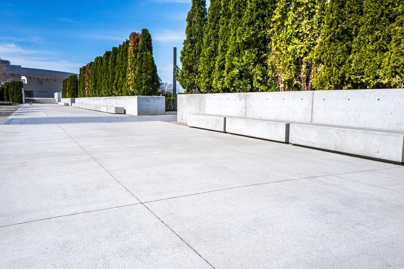 Urban Walkway Lined with Concrete Blocks and Trees in Background HDRi ...