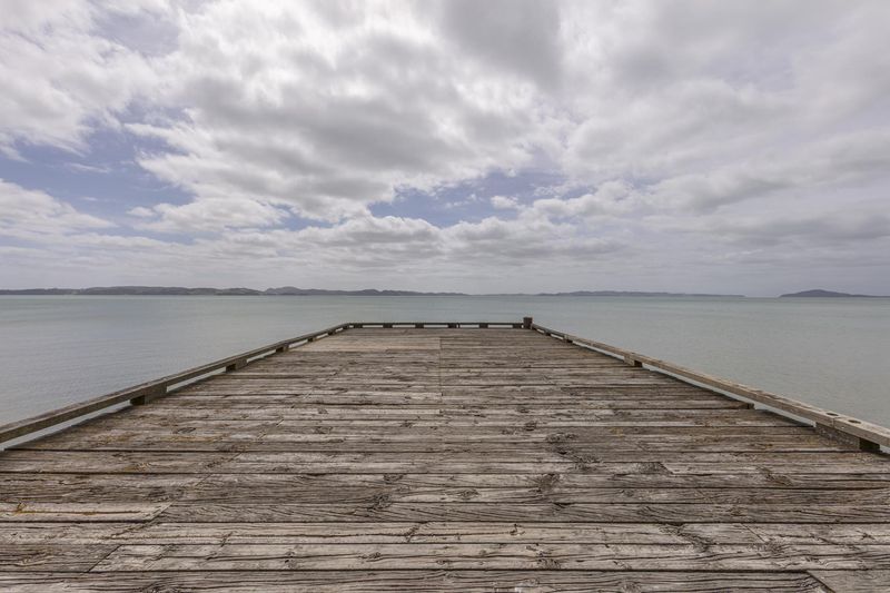 Wooden Dock in Coastal Landscape with Mountains HDRi Maps and Backplates